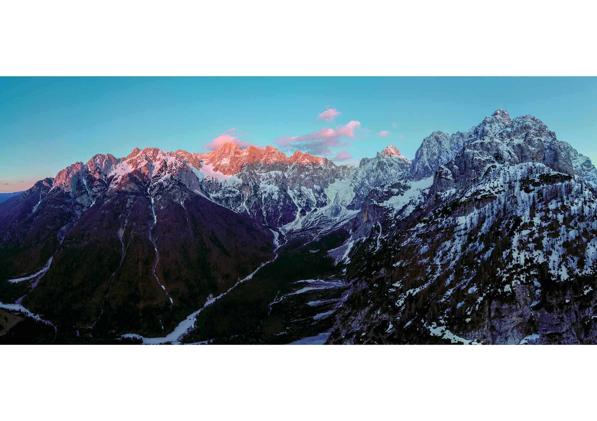 Sunset burning mountains from the view of Vršič pass.